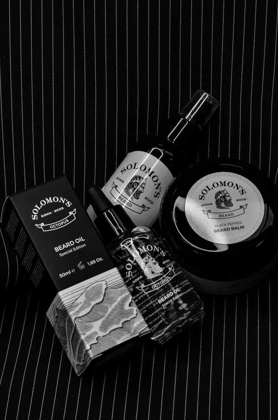 Pomade, beard oil and a wooden comb
