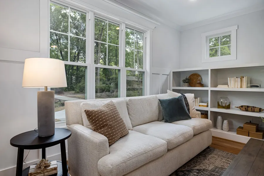A windows, shutters and shading company website showing an instant quote configurator and a before and after gallery